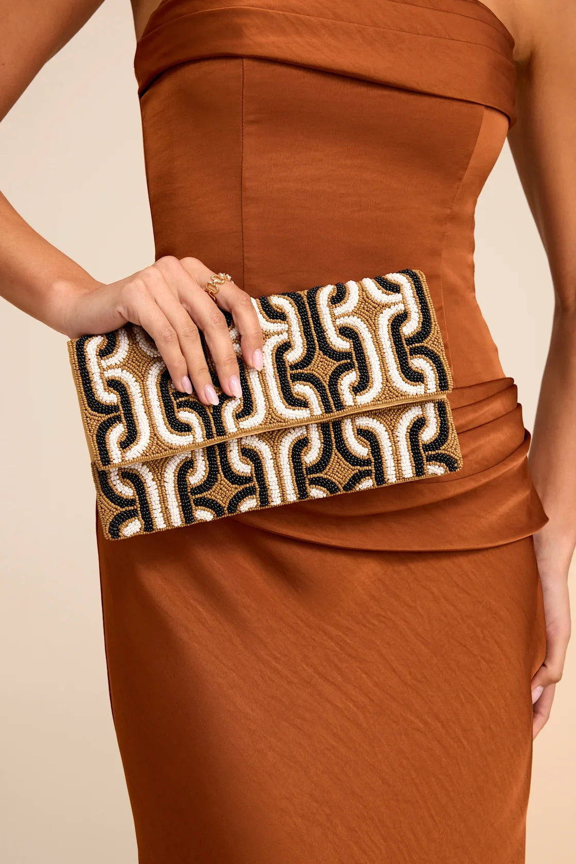 Sikuna Beige and Black Beaded Clutch